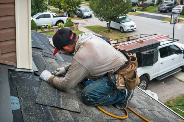 Professional Storm Damage Roof Repair technician working in North Arlington, NJ